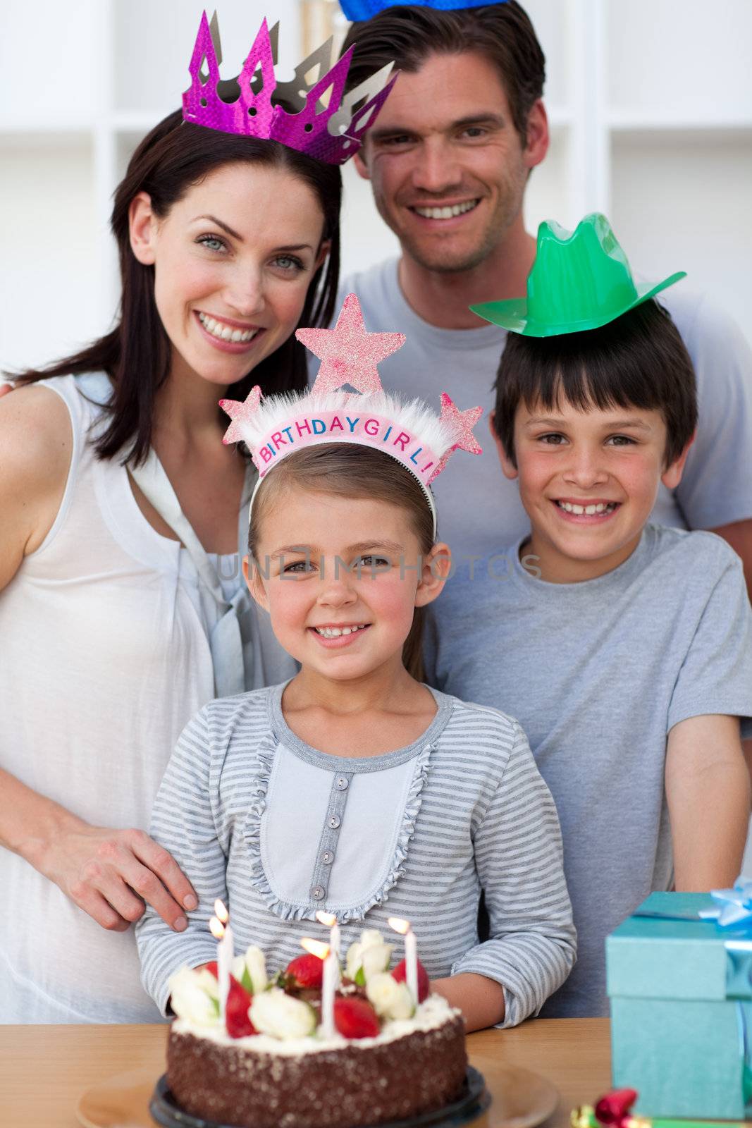 Family celebrating a birthday at home