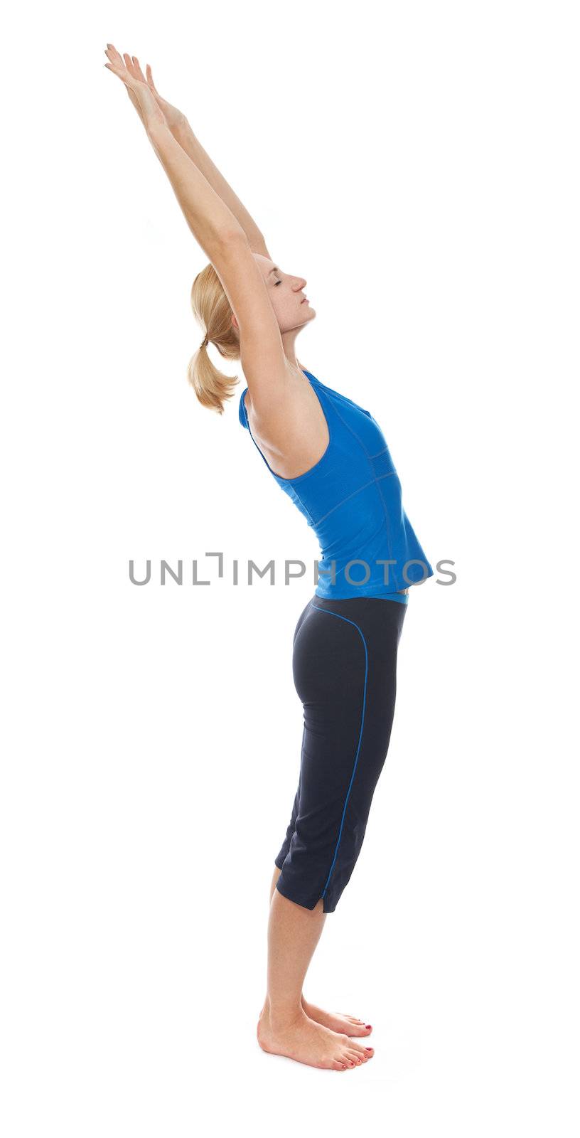 Practicing Yoga. Young woman isolated on white background