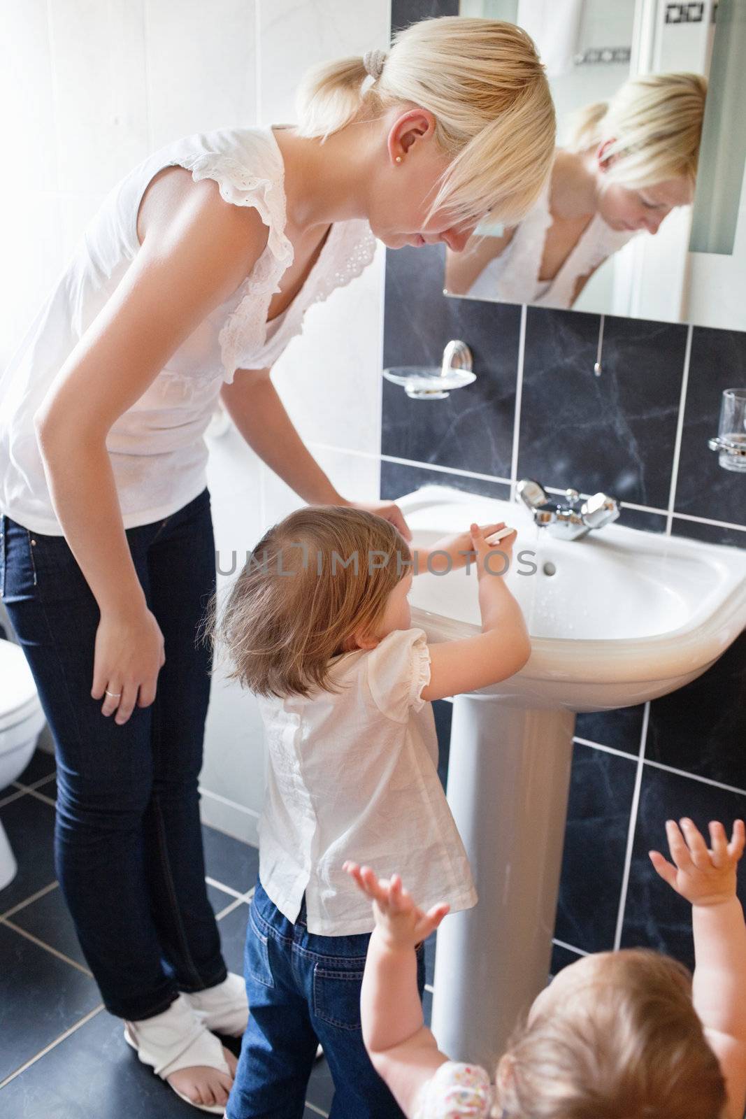 Family in the bathroom by Wavebreakmedia