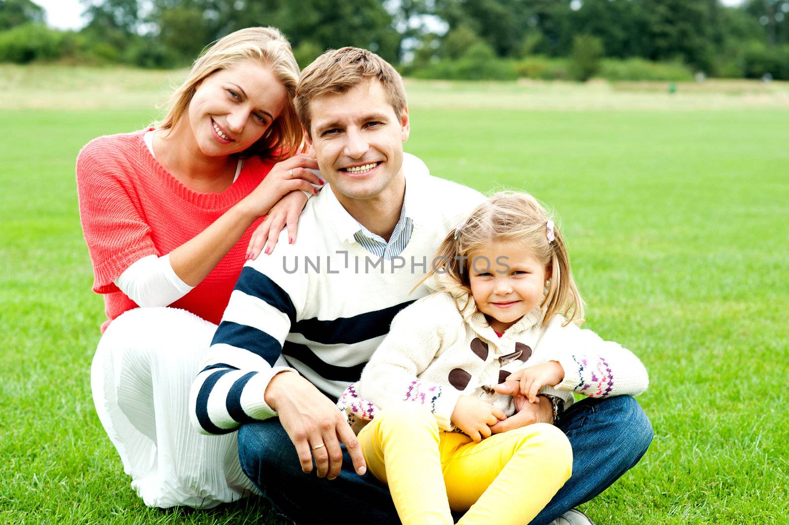 Outdoor happy caucasian family relaxing, spring day