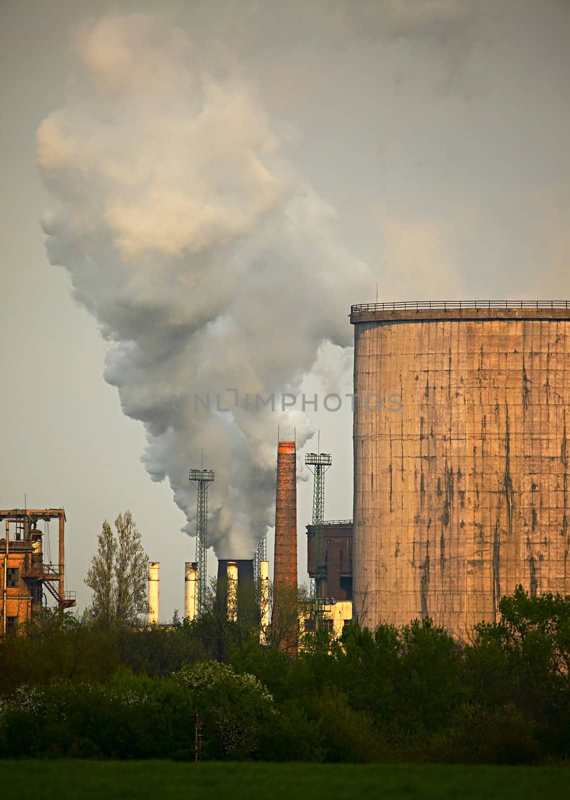 Old, smoking industrial plants