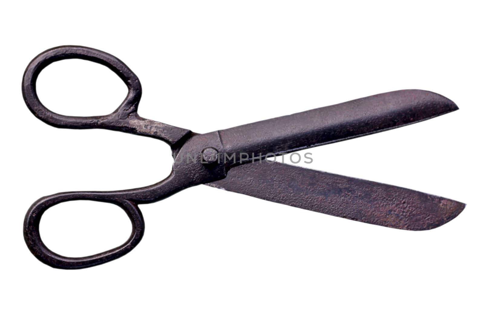 A pair of rusty old scissors or seamstress shears. Isolated