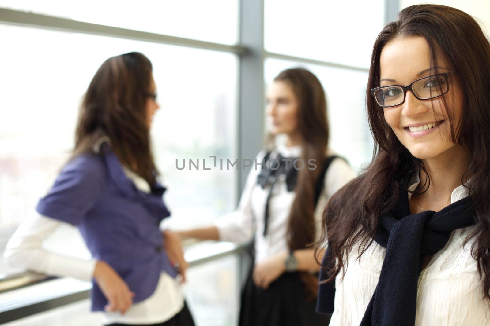 Student meeting smiley girl face on foreground 