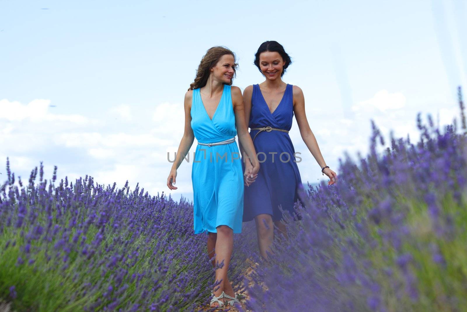 two women on lavender field by Yellowj