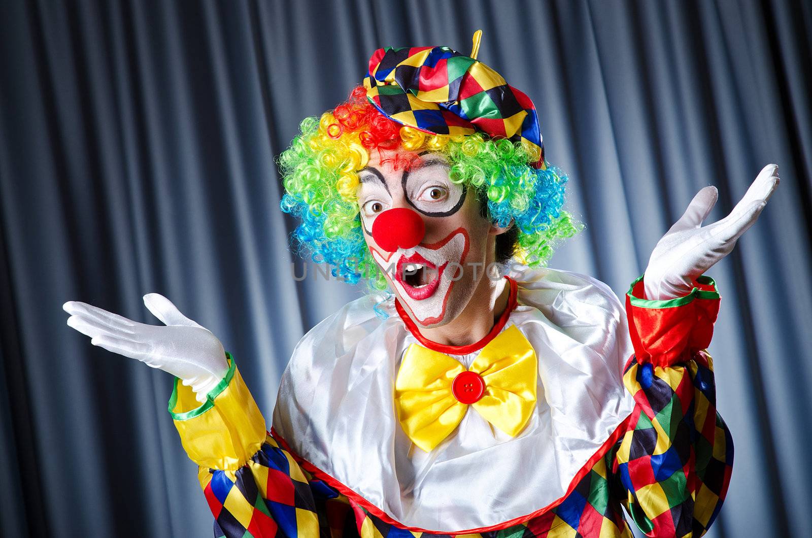 Funny clown in studio shooting by Elnur
