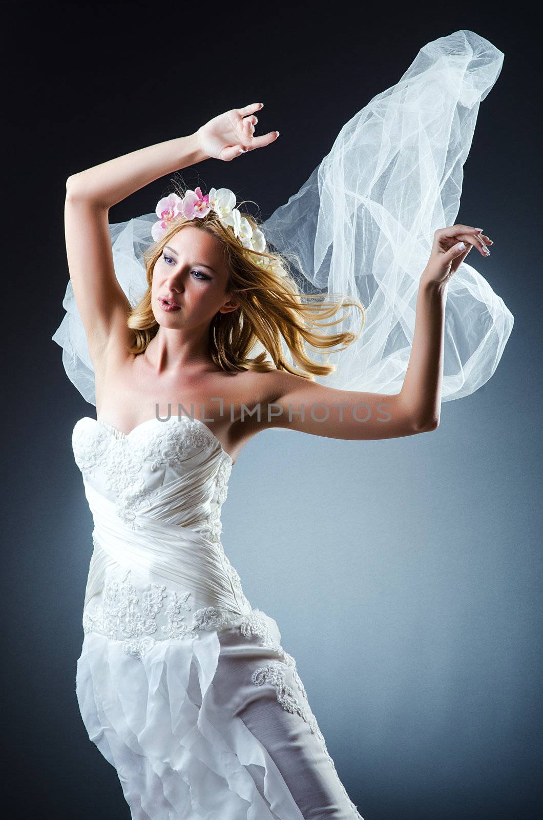 Bride in white dress in studio
