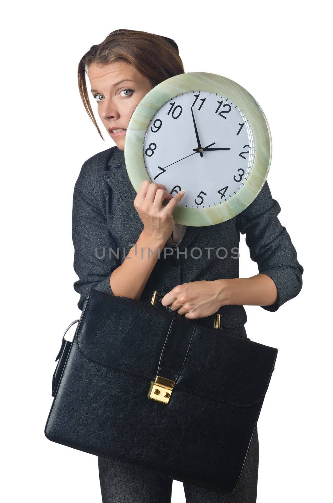 Businesswoman with clock isolated on white