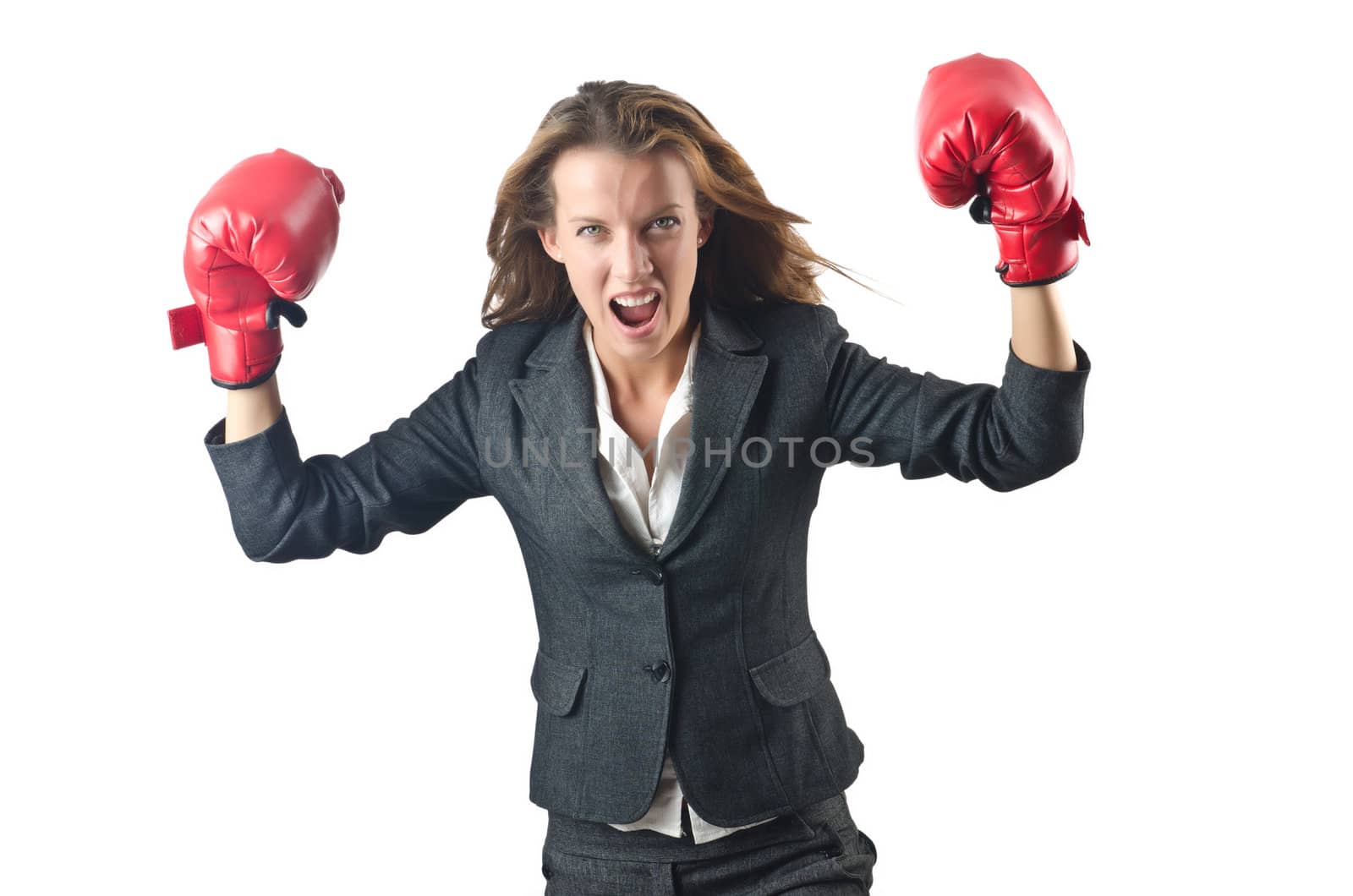 Young businesswoman in boxing concept