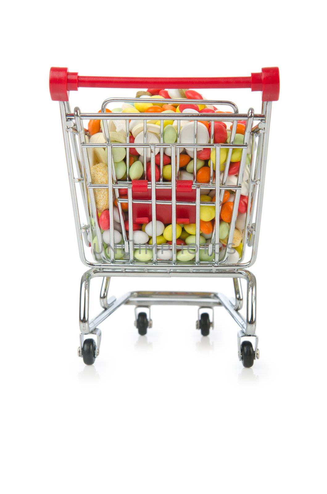 Shopping cart with many colourful pills