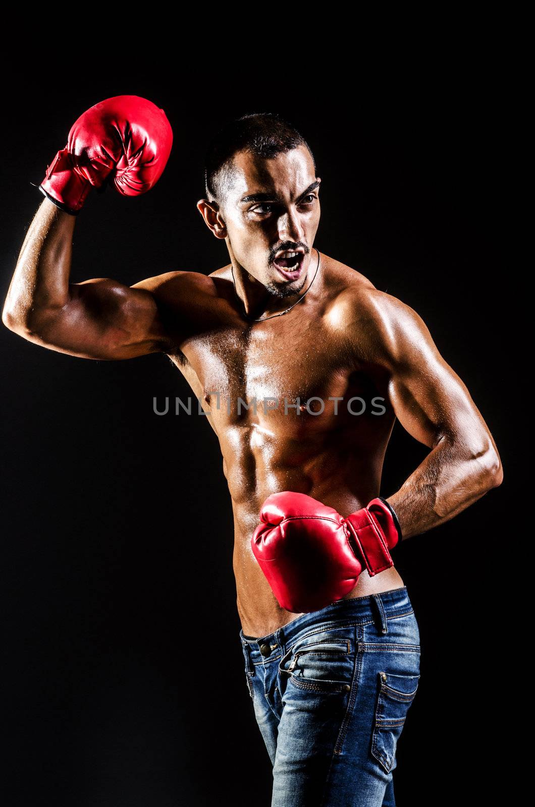 Young man with boxing gloves by Elnur