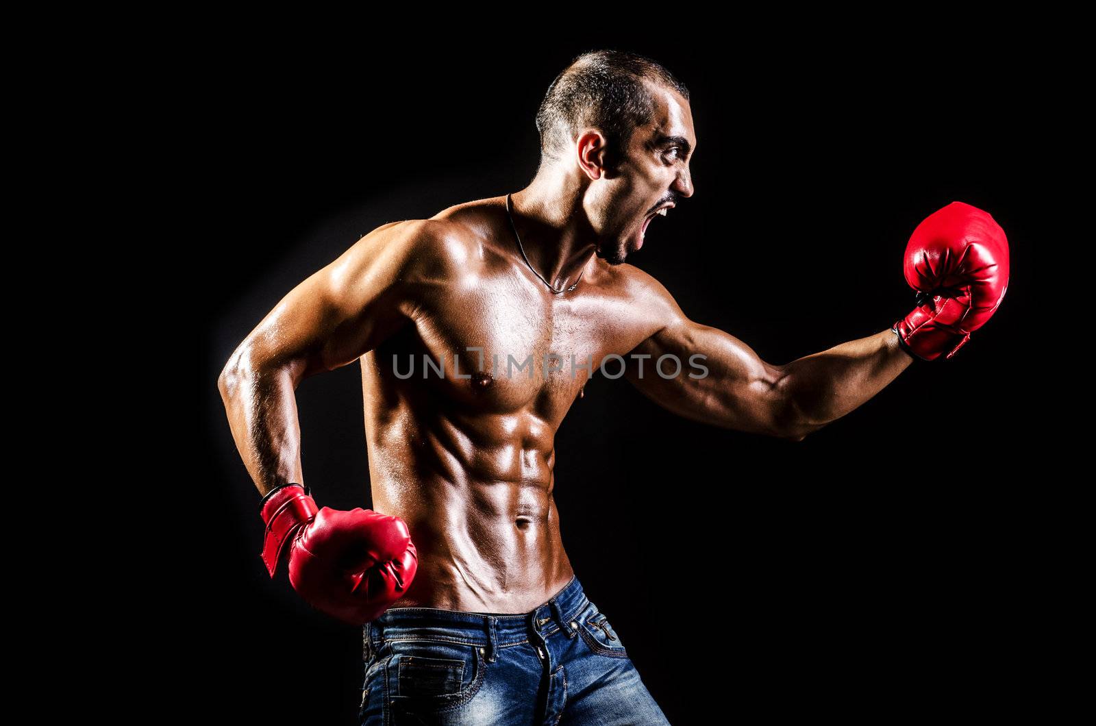 Young man with boxing gloves by Elnur