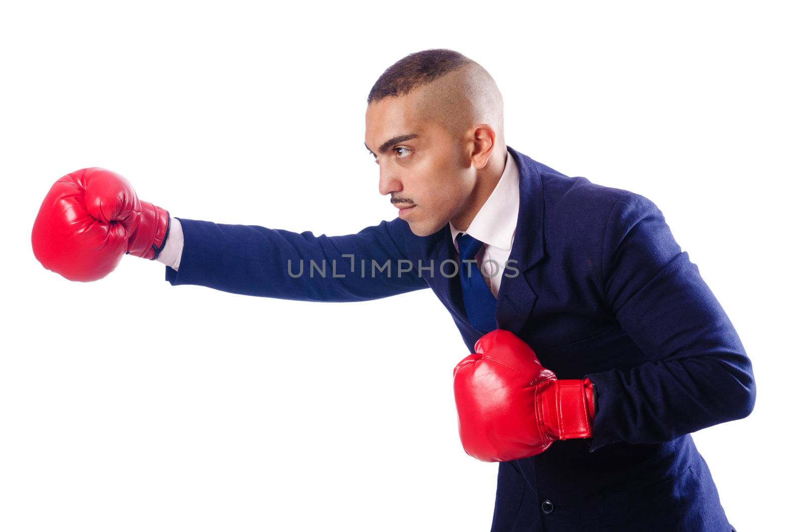 Handsome businessman with boxing gloves by Elnur