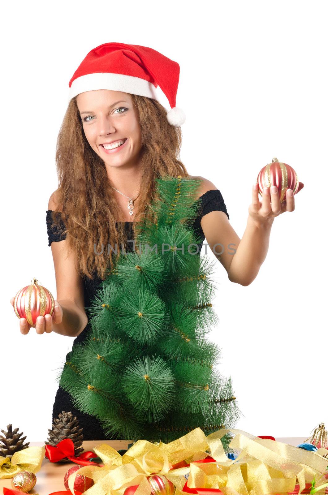 Young woman with christmas tree