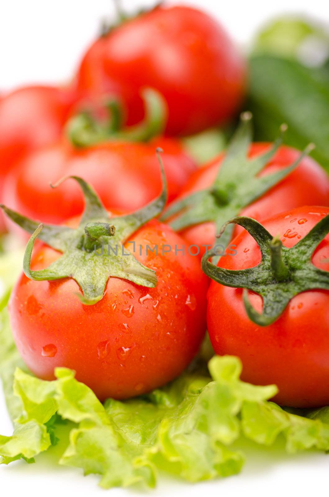 Cucumbers and tomatoes ready for salad by Elnur