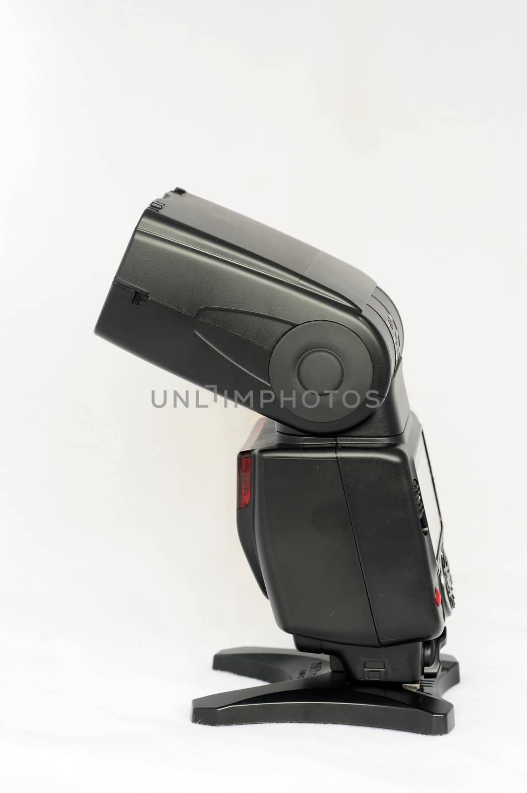 Flash speedlight on a white background
