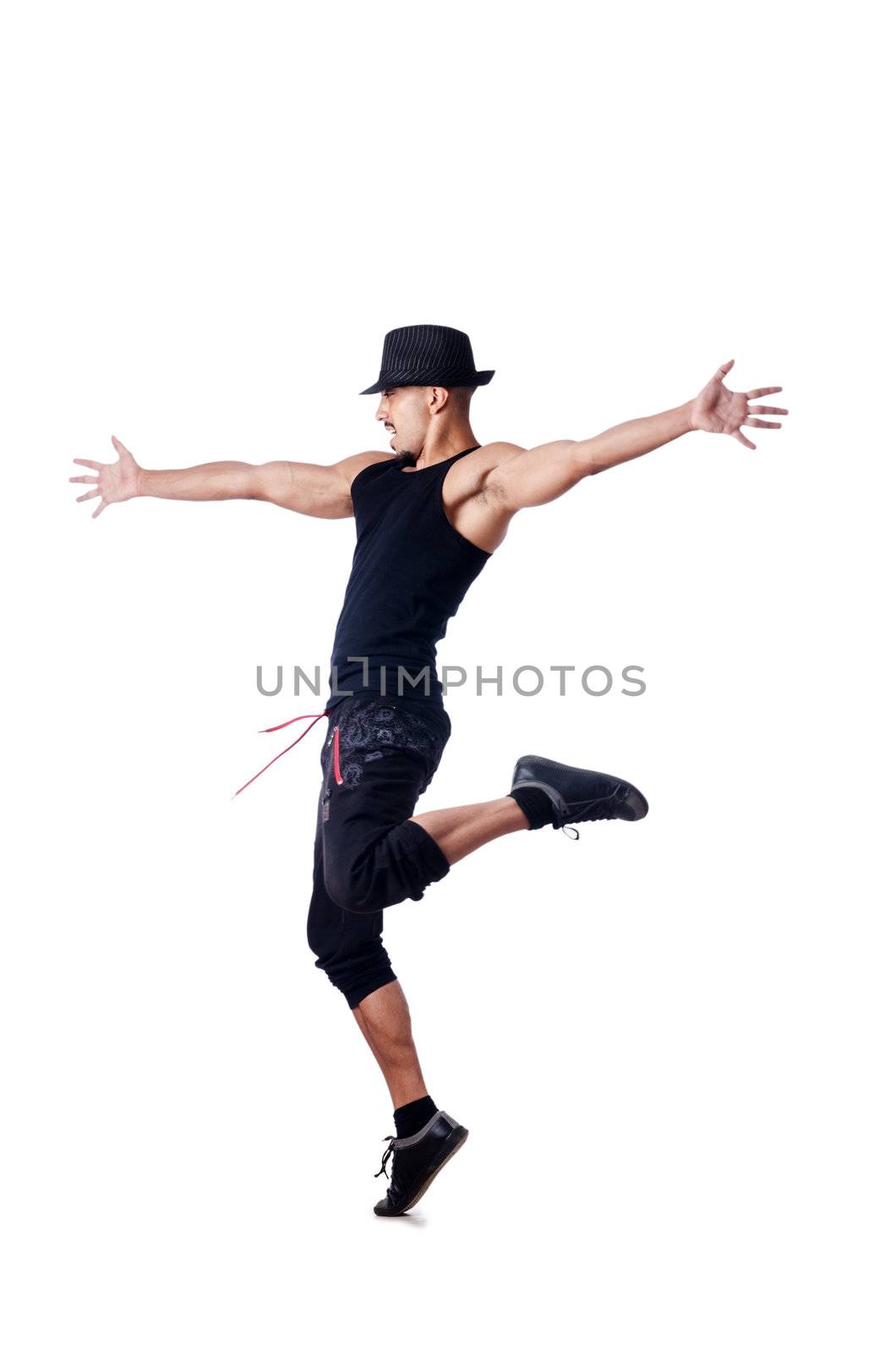 Muscular dancer isolated on white by Elnur