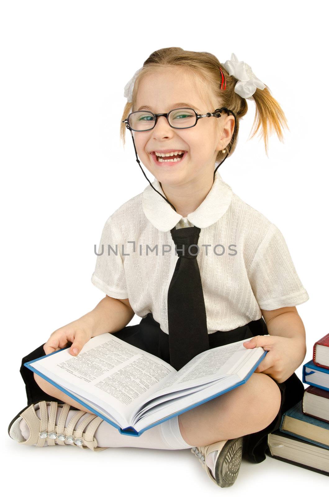 Little girl with books on white