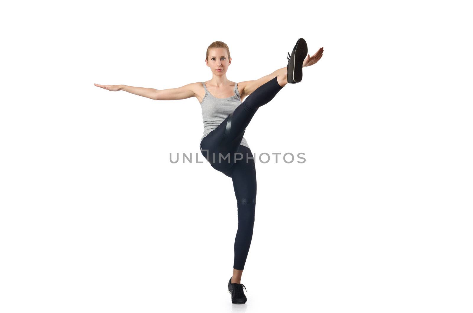 Woman doing exercises on white by Elnur