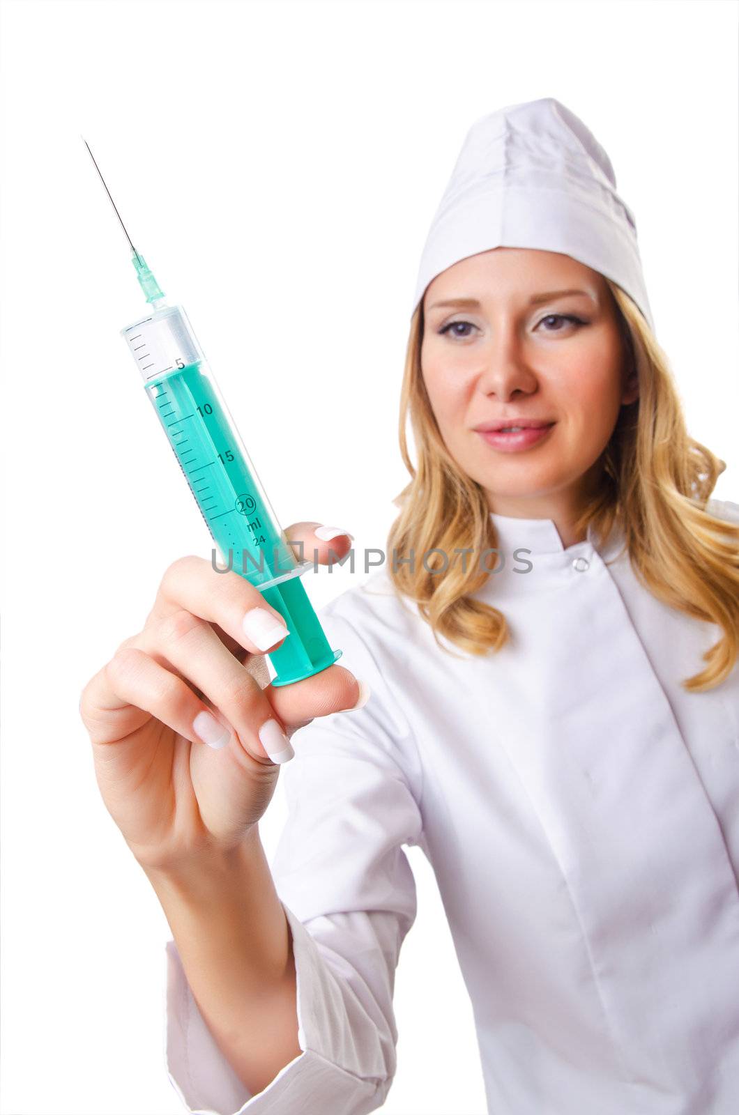 Woman doctor with syringe on white