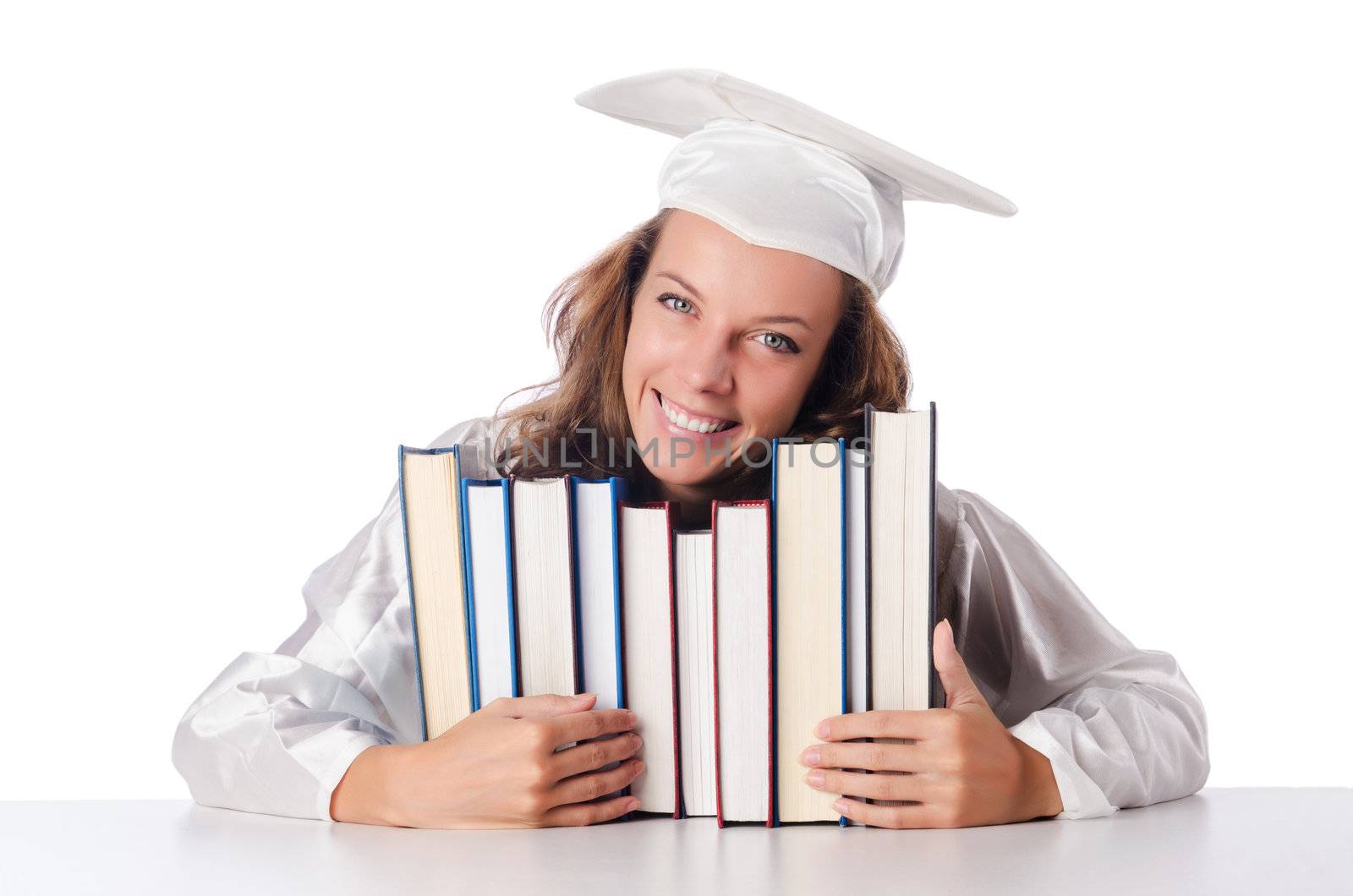 Happy graduate with lots of books on white