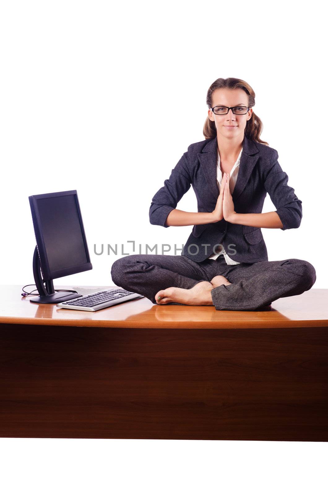 Woman meditating on the desk by Elnur