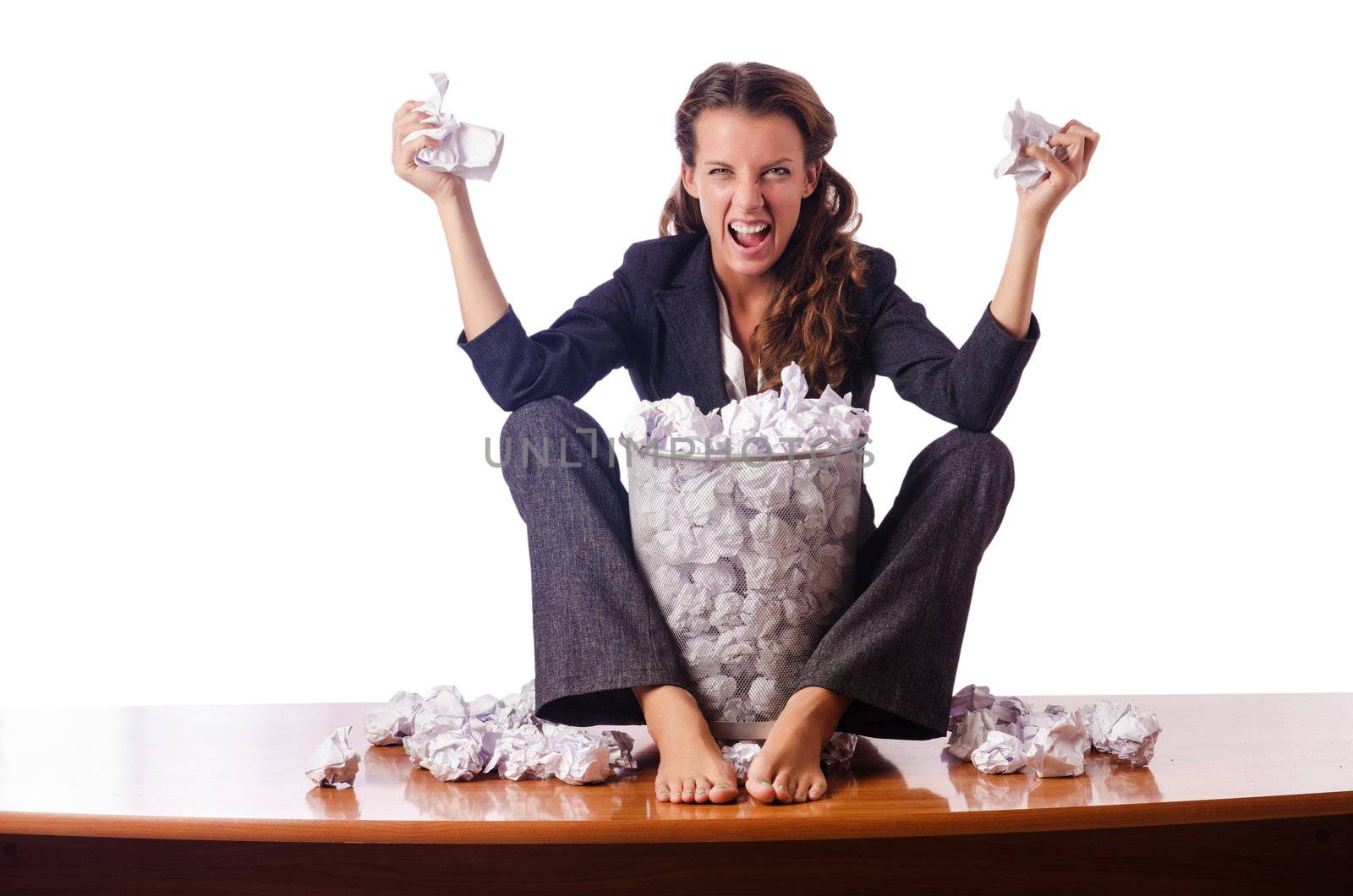 Woman with lots of discarded paper