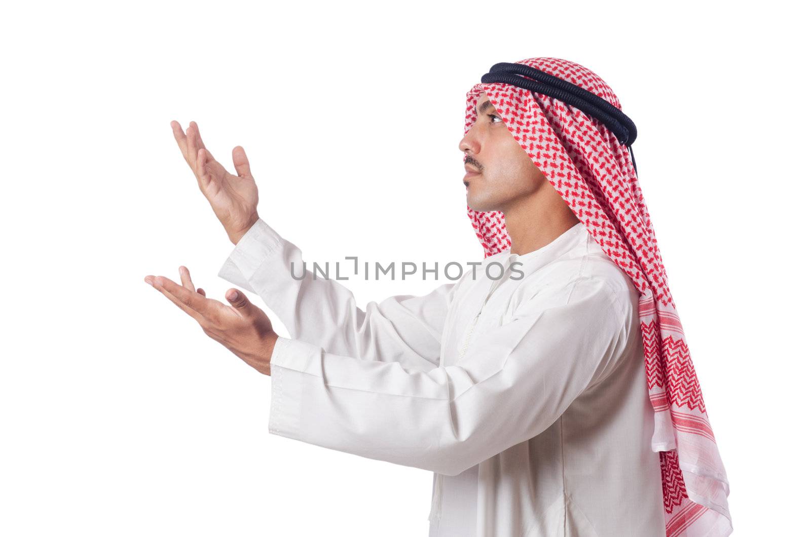 Arab man praying on the white