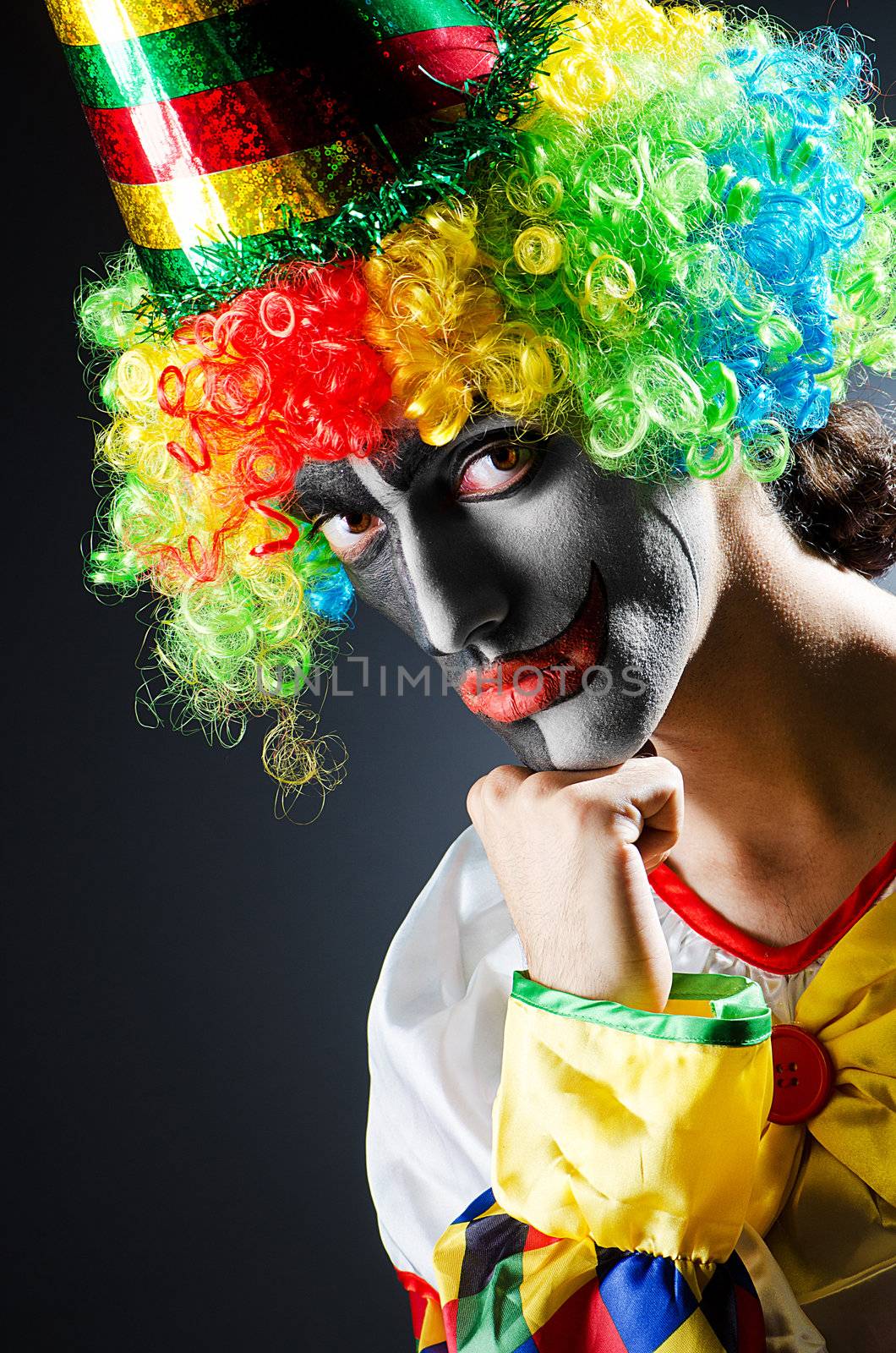 Funny clown in studio shooting