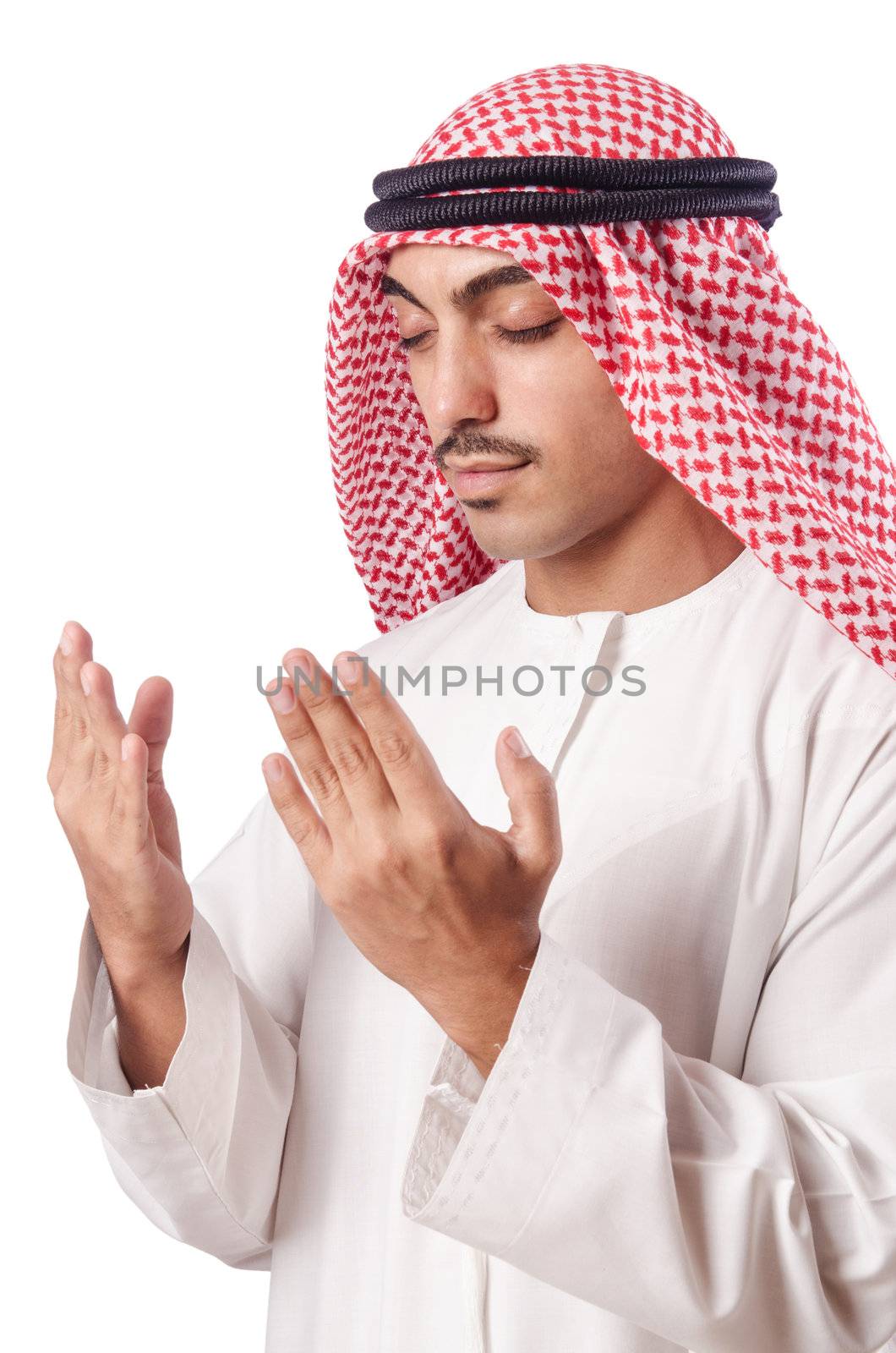 Arab man praying on white by Elnur