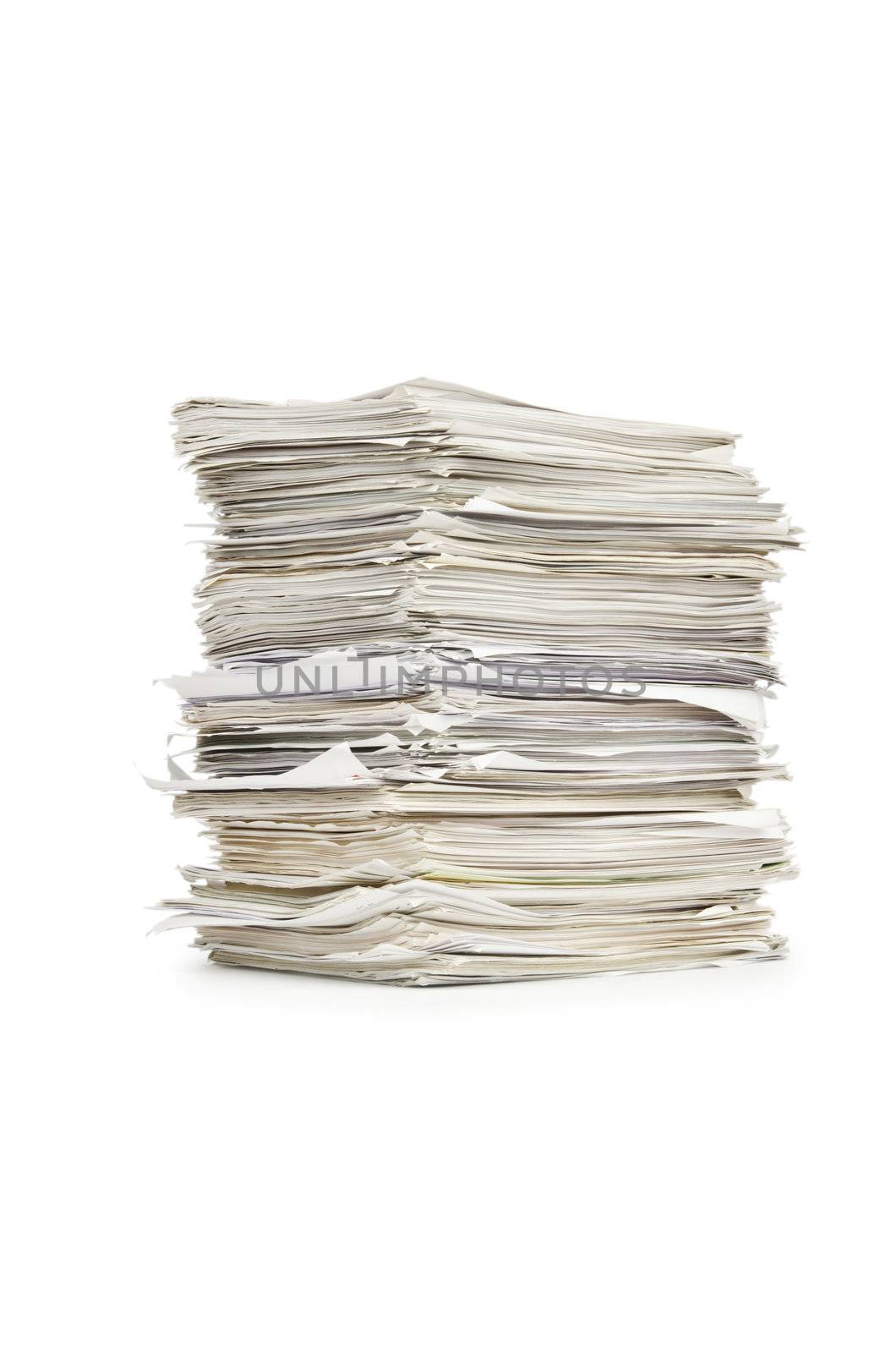 Pile of papers on white by Elnur