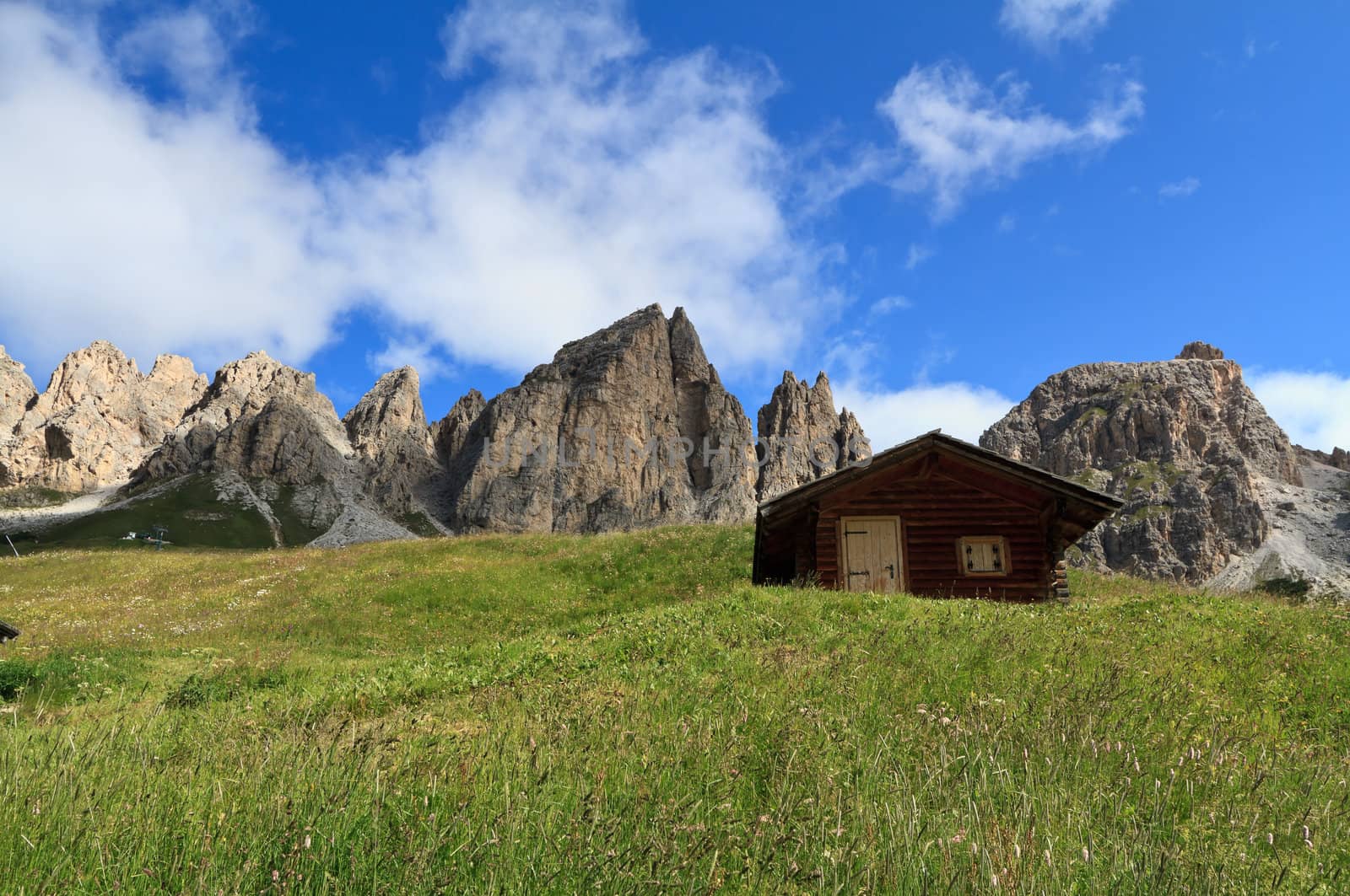 barns beneath Cir group, Gardena pass, Trentino Alto Adige, Italy