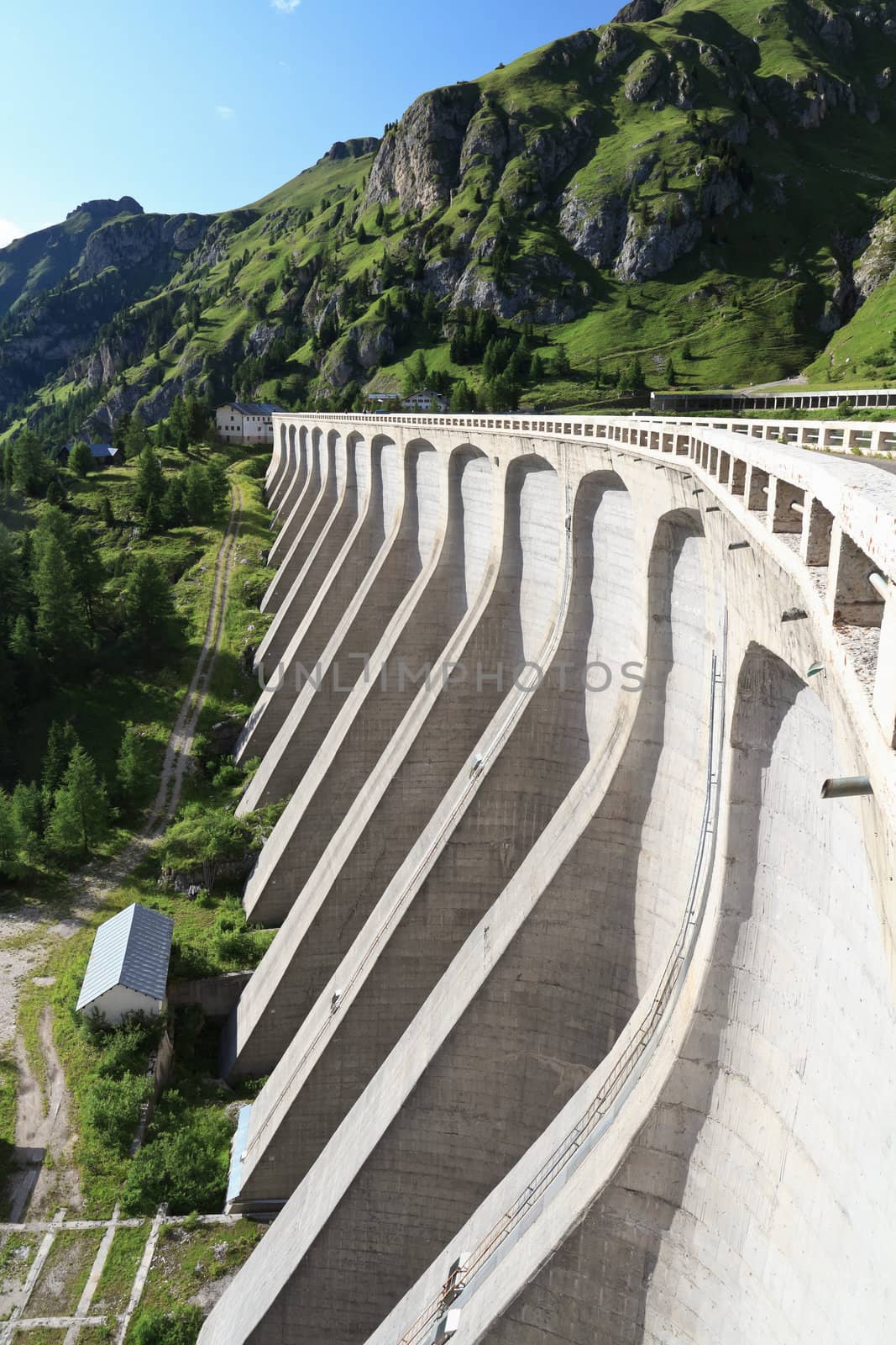 the great concrete dam in Fedaia lake Trentino, Italy
