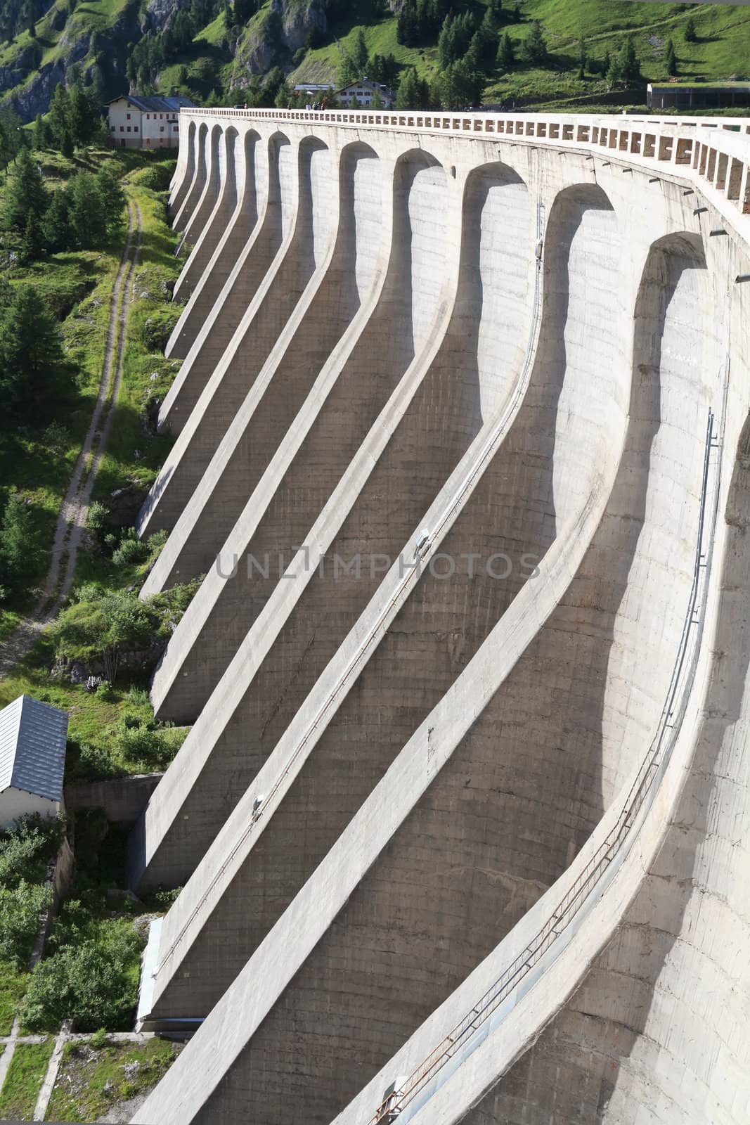 concrete dam of Fedaia reservoir, Trentino, Italy