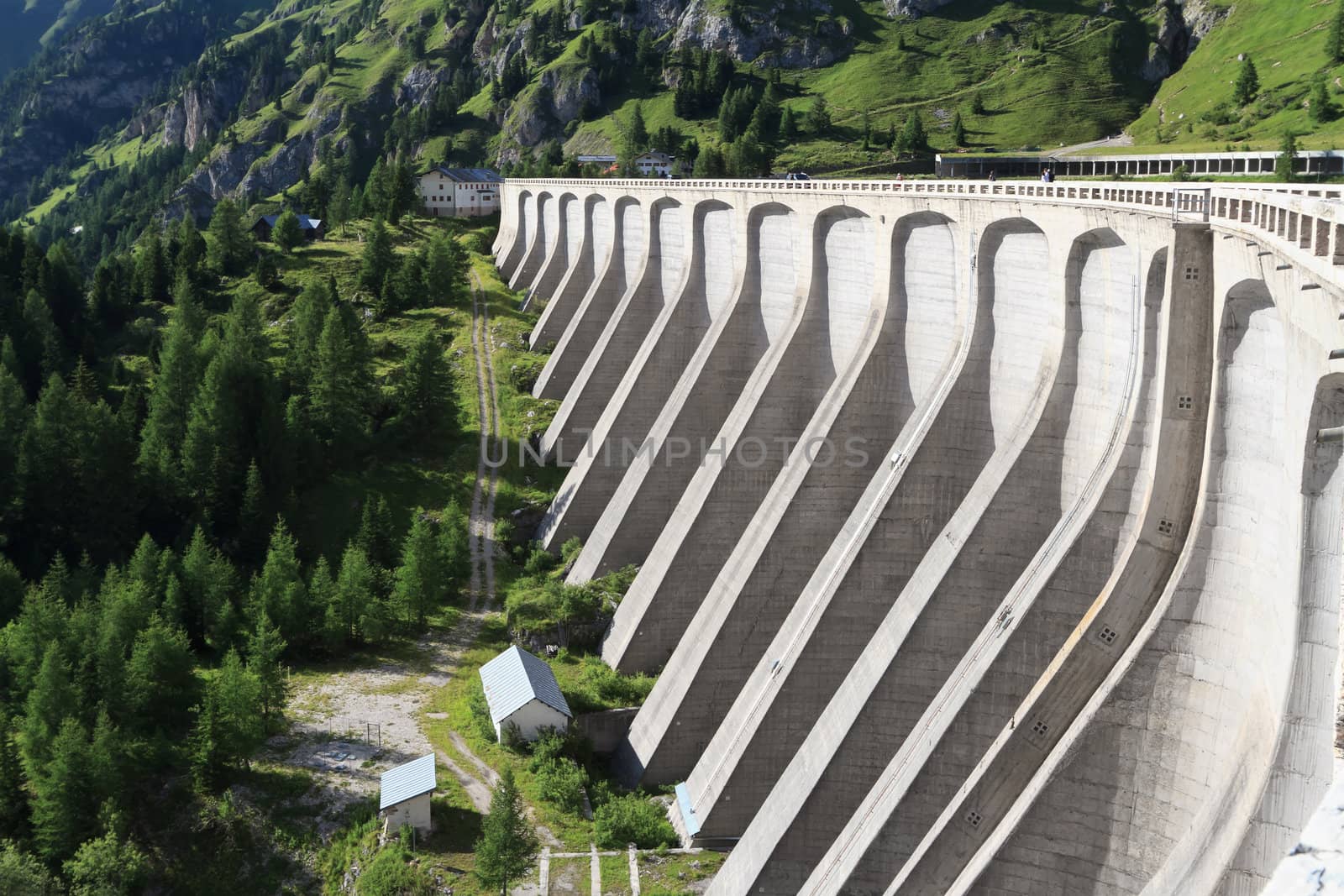 the great concrete dam of Fedaia reservoir, Trentino, Italy