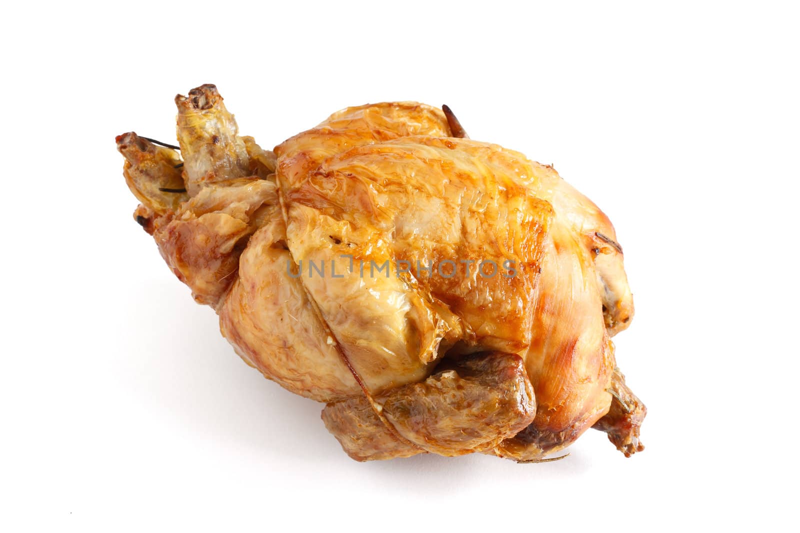 whole roasted chicken over white background