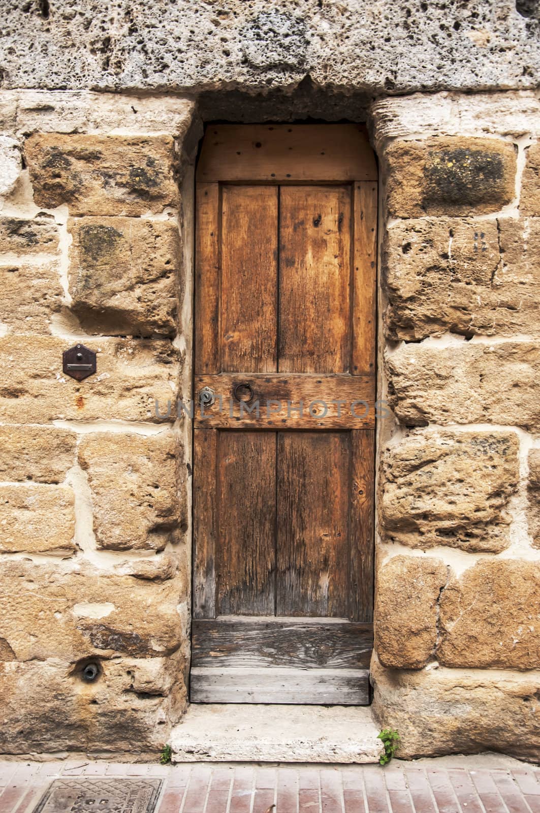 door of the old building in italian village of tuscany, italy