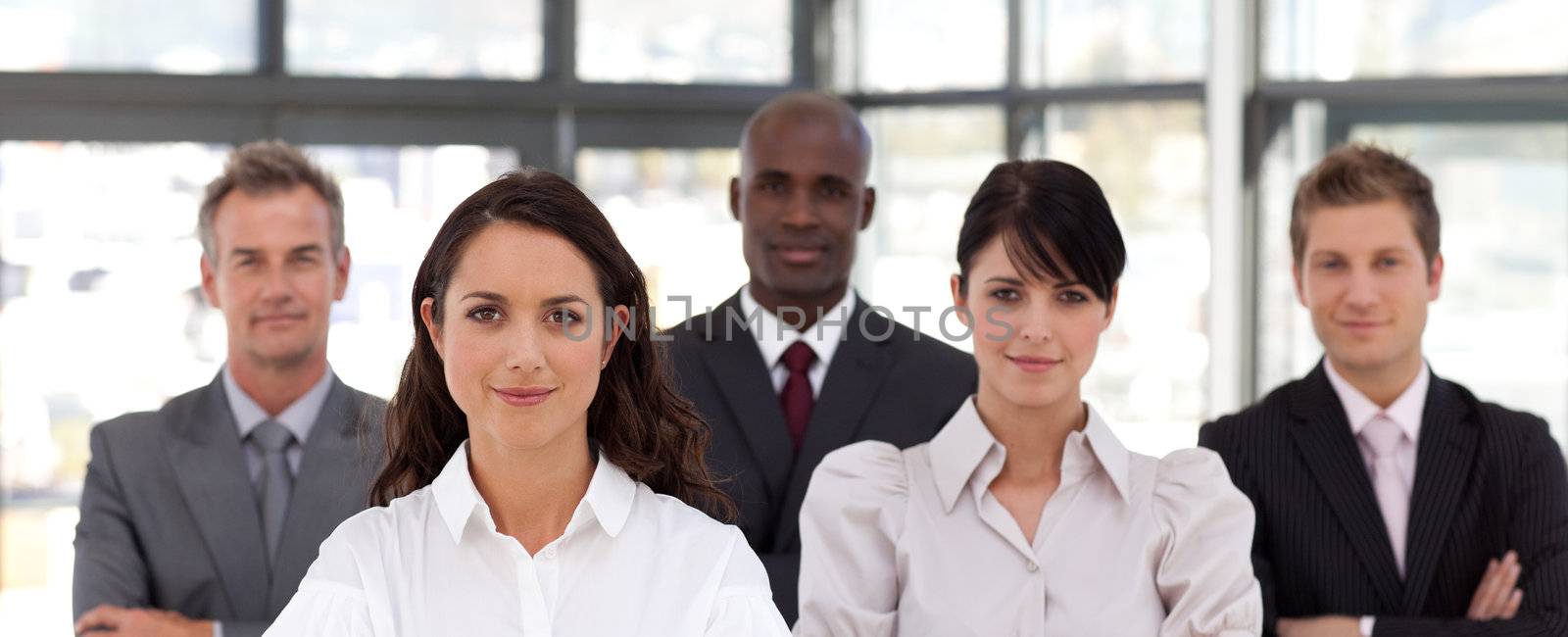 Portrait of business people looking at the camera  by Wavebreakmedia