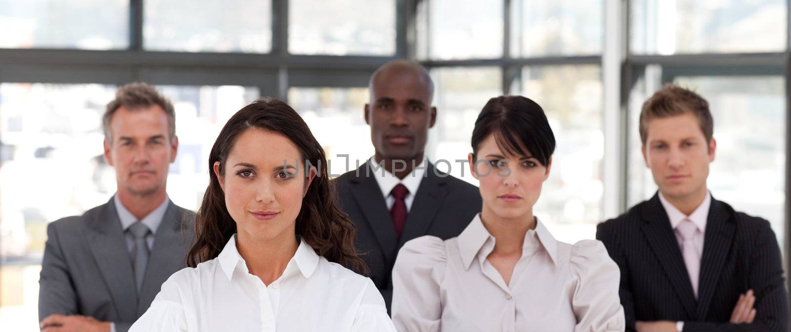 Portrait of multi-ethnic business people looking at the camera in a office