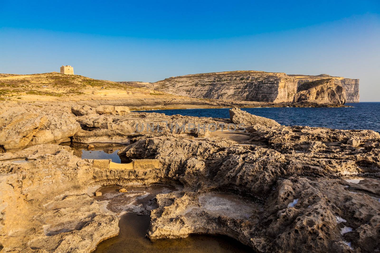 Rugged coast of the Maltese island Gozo, near Dwejra and the Fungus Rock