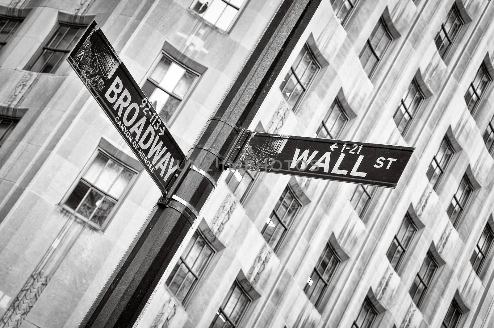 Wall street and Broadway street sign black and white, New York, USA