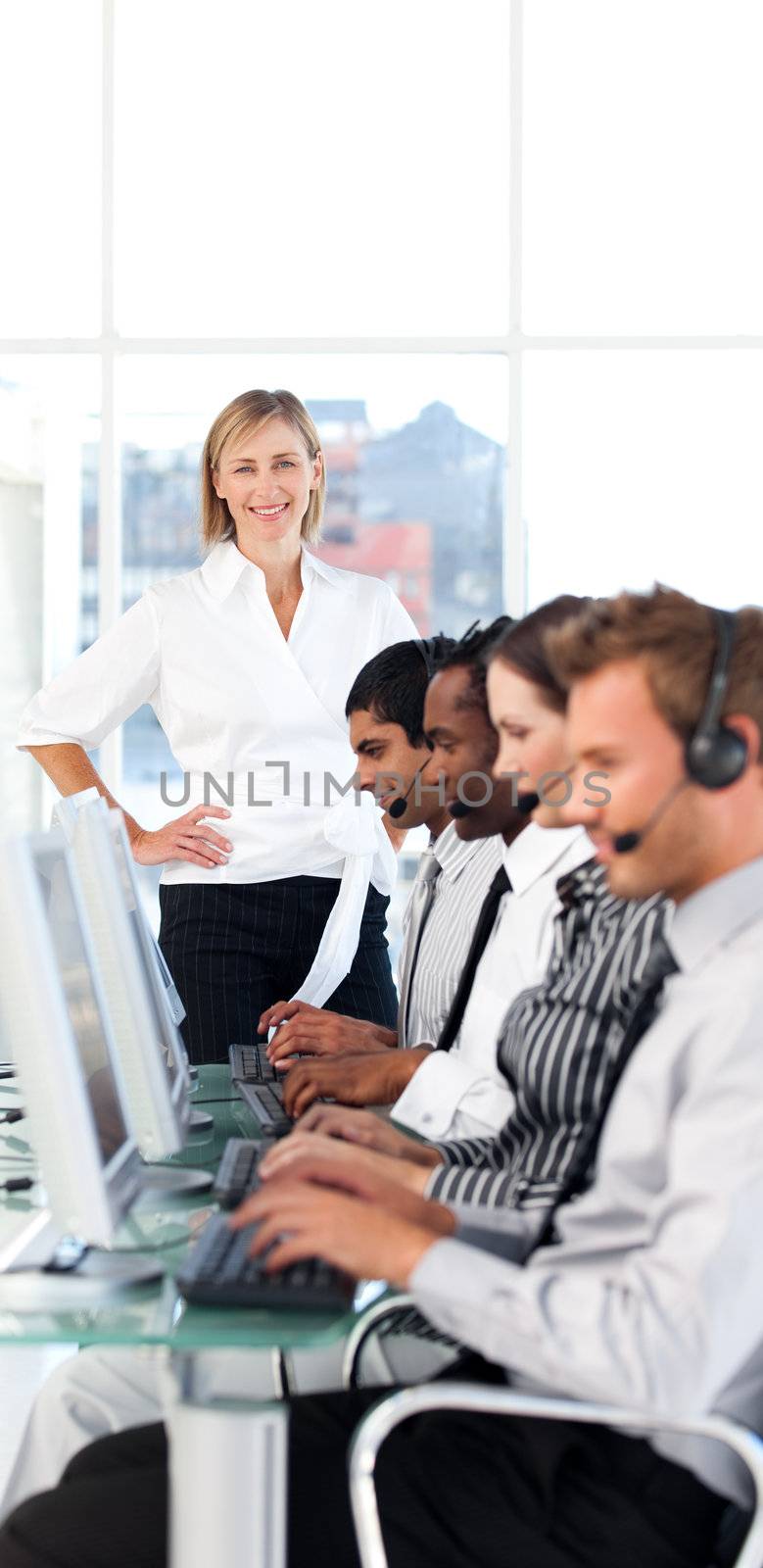 Caucasian female manager leading her representative team in a office