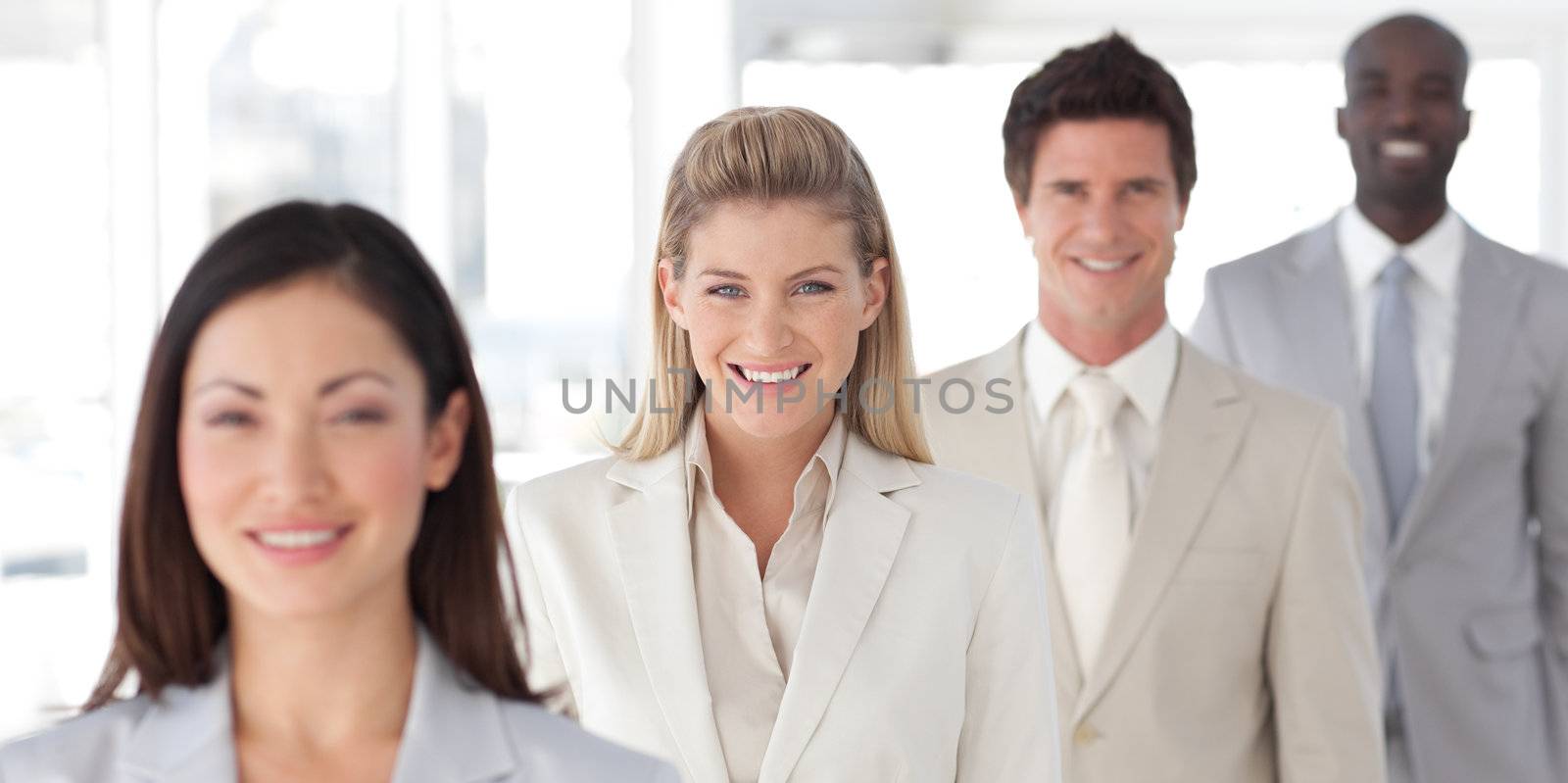 Portrait of a happy team at work in a office