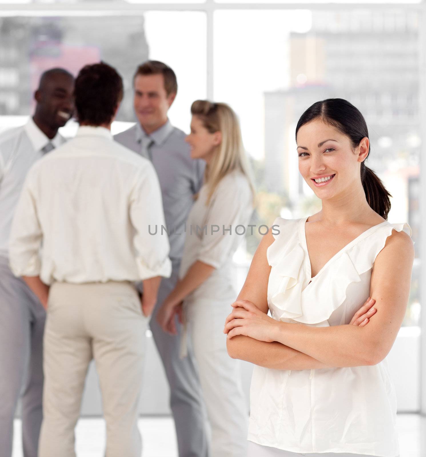 Diverse people talking together at work in a office