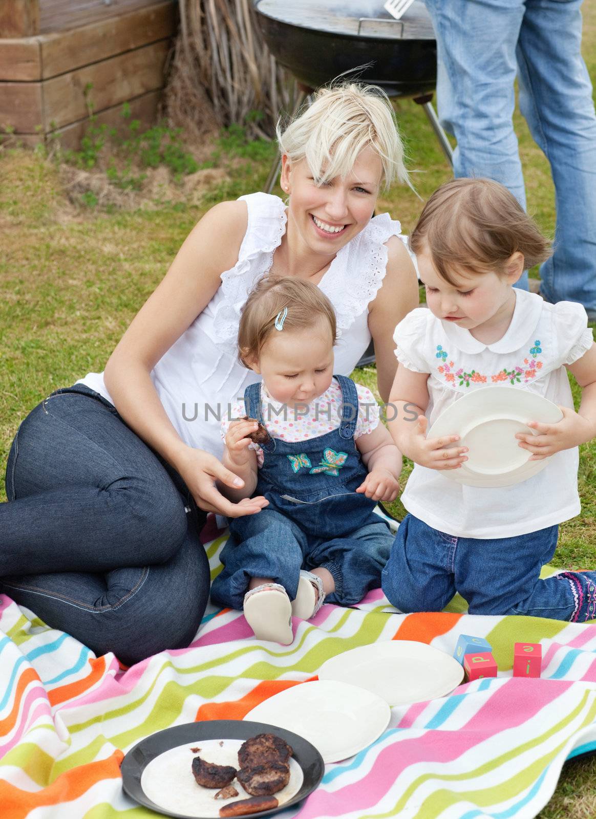 Family having a picnic together by Wavebreakmedia