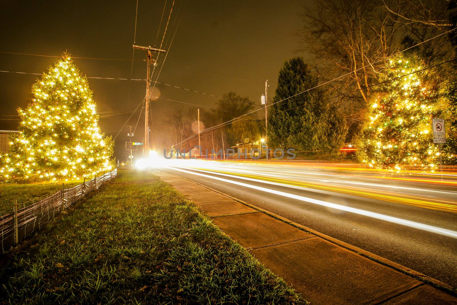 Traffic lights and light trails during busy christmas holiday season at mcadenville north carolina by digidreamgrafix