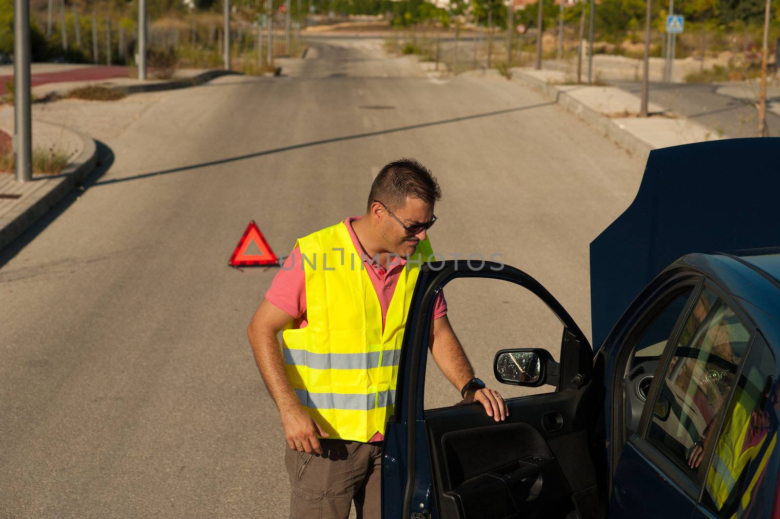 Frustration after a breakdown, guy not very pleased with his car