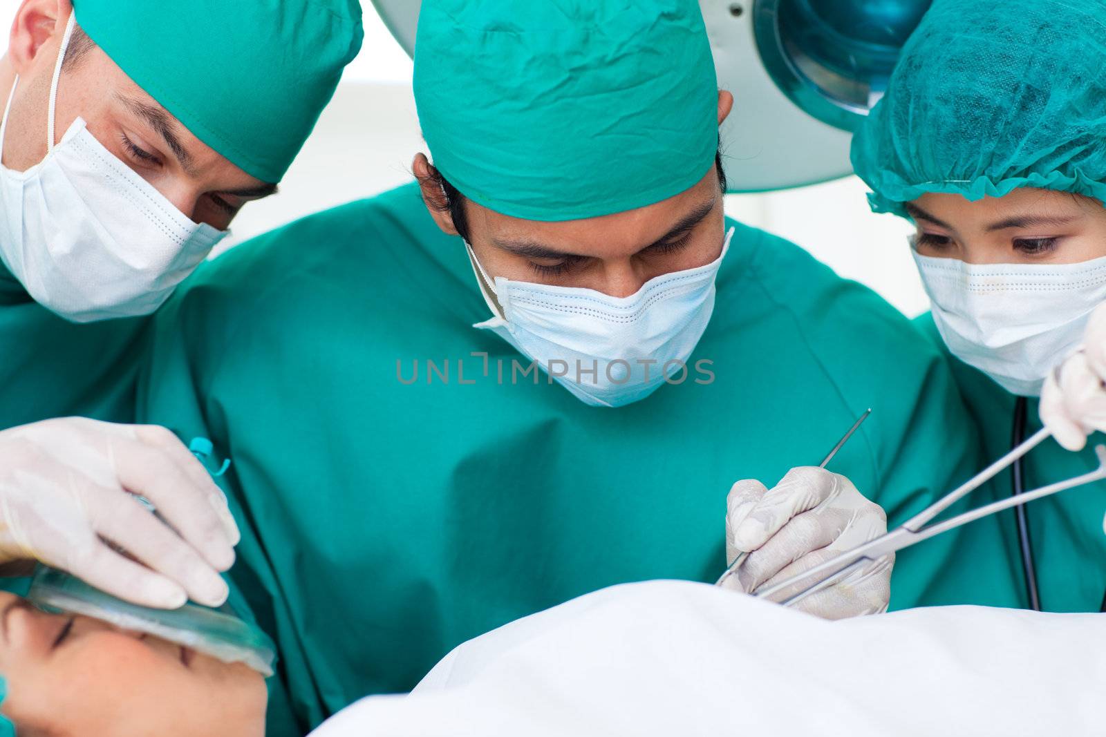 Portrait of surgeons in operative room. Medical concept