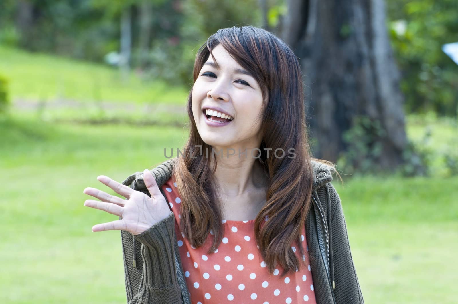 Portrait Of Asian Young Woman In garden in winter season