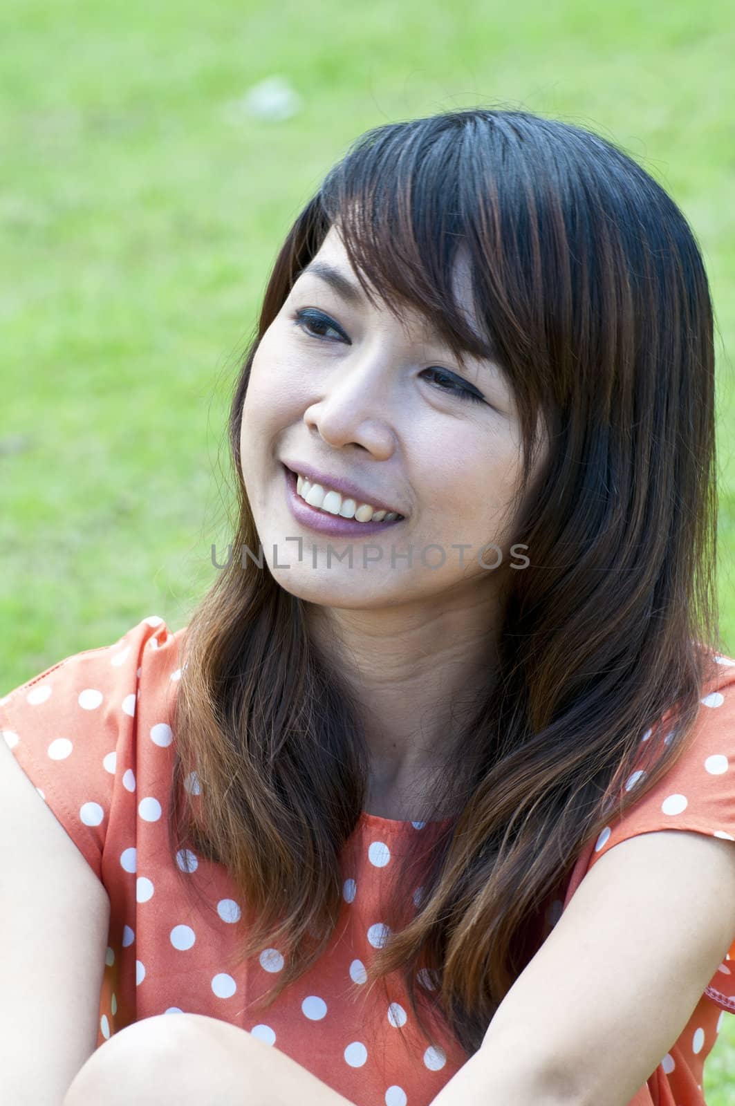 Portrait Of Asian Young Woman In garden in winter season