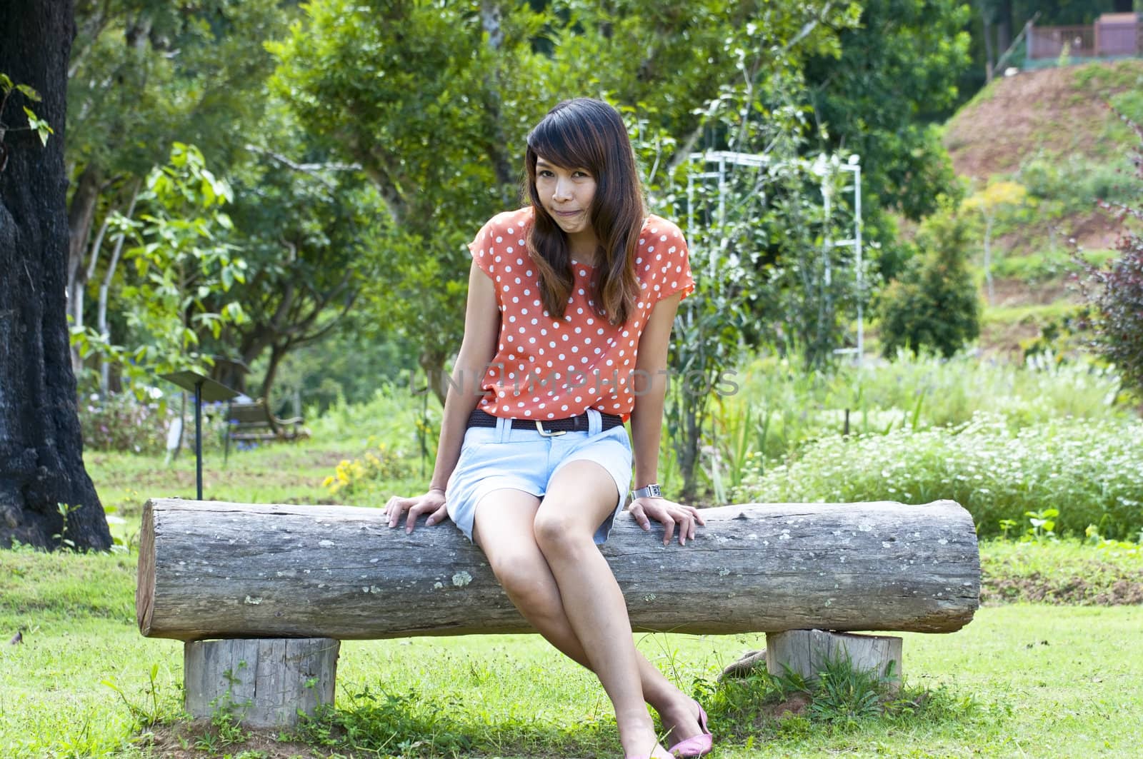 Portrait Of Asian Young Woman In garden in winter season